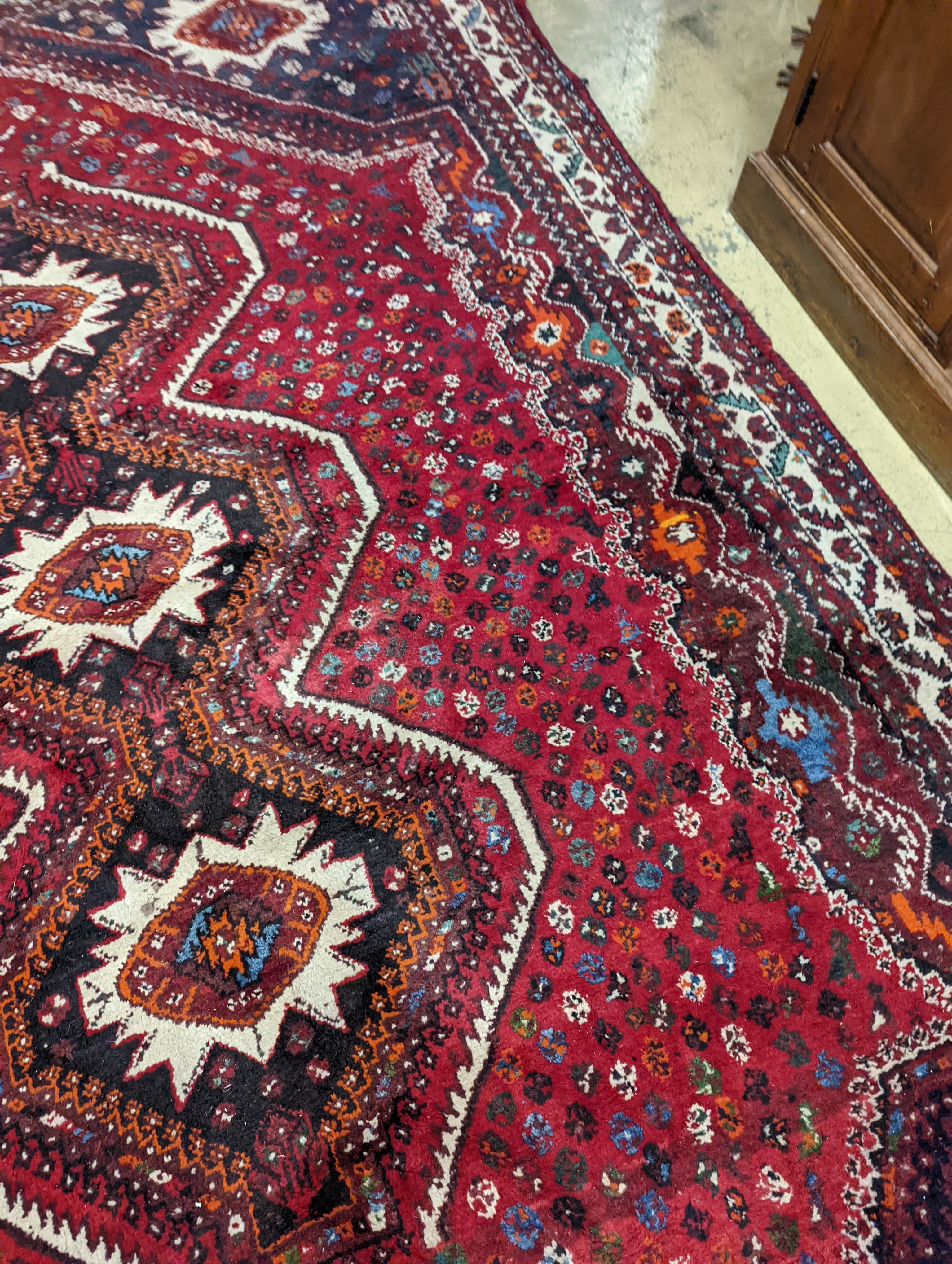 A North West Persian red ground carpet, 335 x 220cm